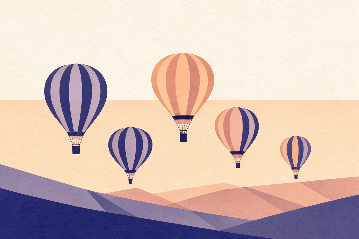flat illustration of hot-air balloons over geometric hills at dawn